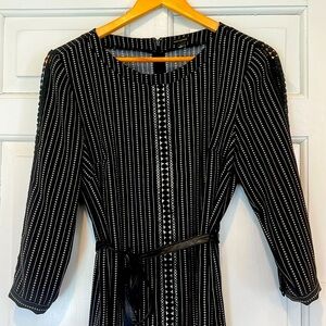 Gorgeous Ann Taylor Size small. Black dress with belt